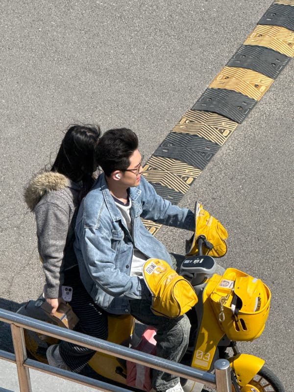 Young people lying on streets throughout Zhongtun, China early morning