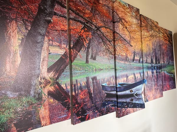 Canvas waterscape artwork displayed on wall in Bulgarian home