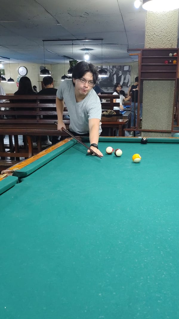 Late-night pool games observed at Miraflores billiards hall