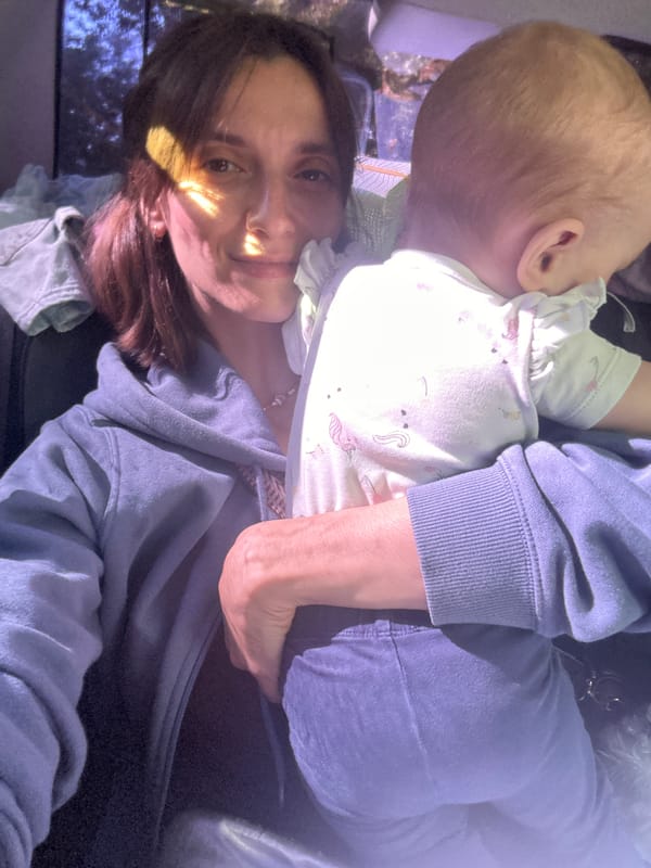 Woman and baby observed in vehicle interior in Moscow