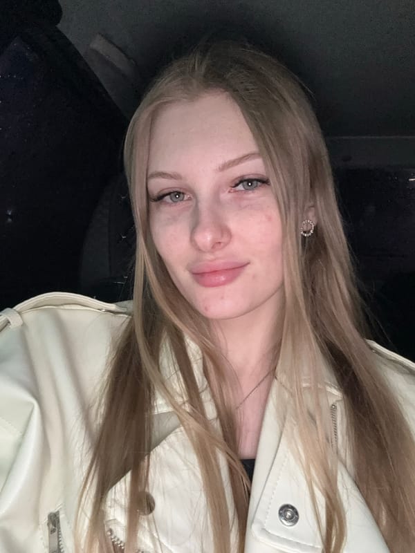 Woman photographed indoors in Perm, Russia