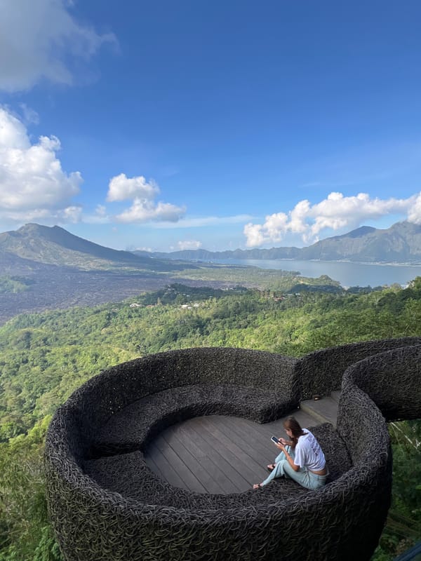 Tourists capture selfies at Kintamani volcanic viewpoints
