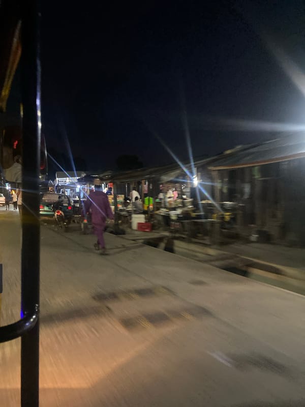 Daytime and nighttime street scenes across Jalingo, Nigeria