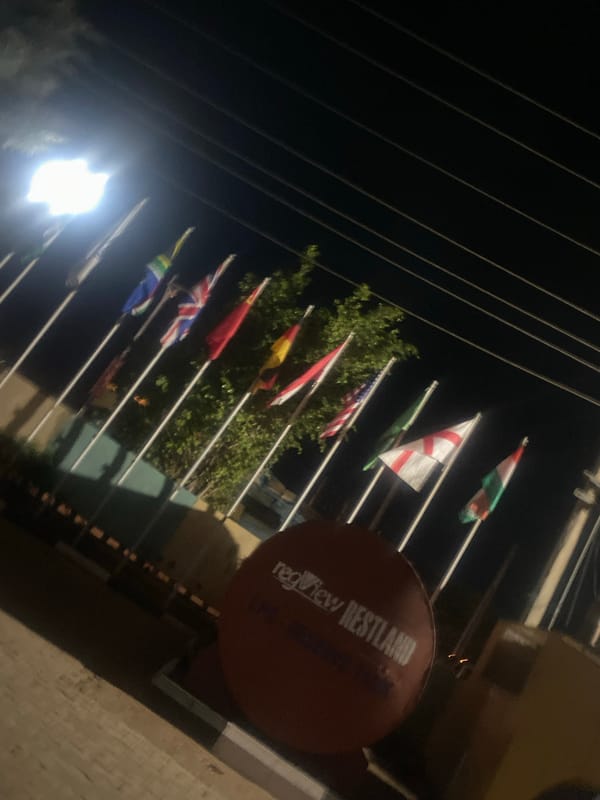 Evening scenes captured in Television, Nigeria show flags and personalized bottle