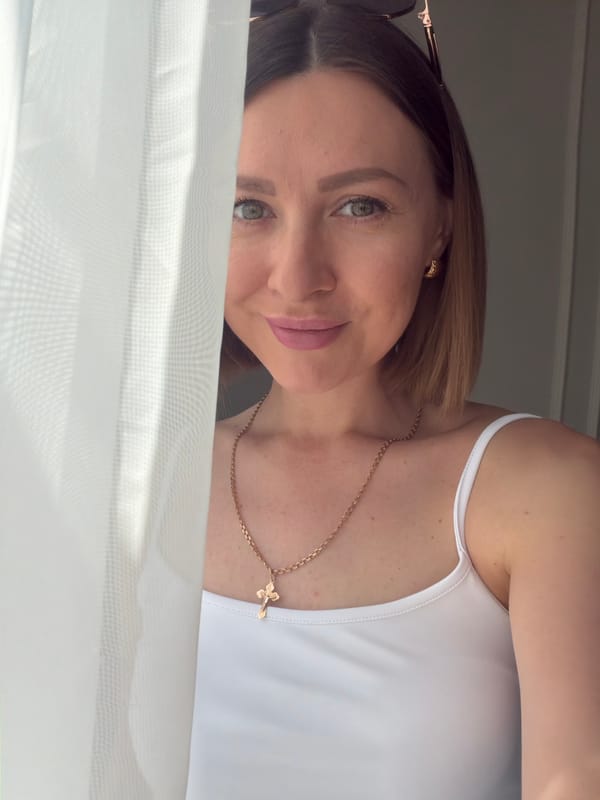 Woman takes selfies in furnished room in Rostov-on-Don