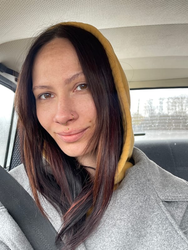 Woman takes selfie in vehicle in Kabanikha, Russia