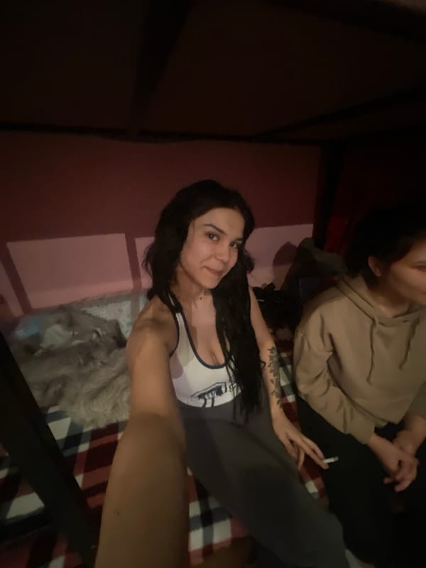 Indoor scene with two people and animal in Berlin