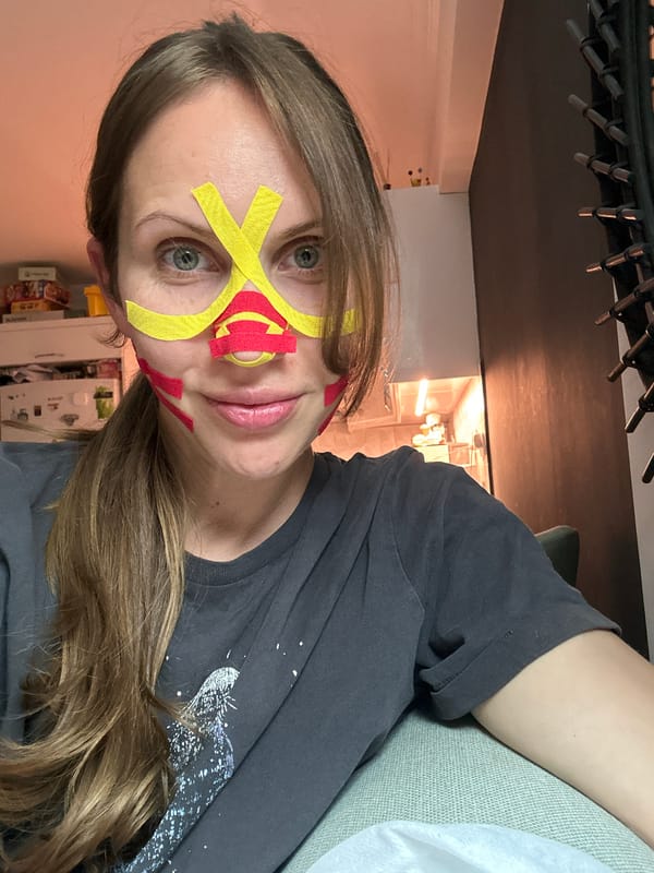 Woman styles hair in bathroom in Fethiye, Turkey