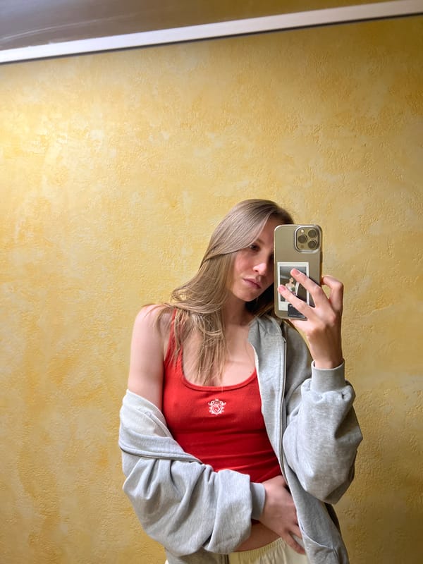 Woman takes selfies with dog in Khimki apartment