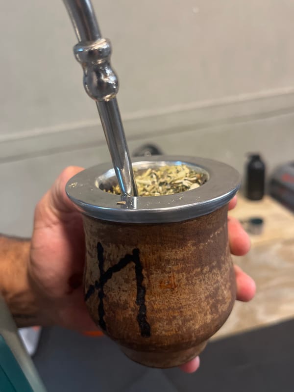 Gym workout session documented with mate breaks in Argentina
