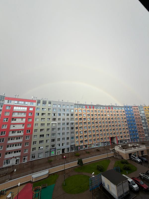 Double rainbow over Saint Petersburg's multi-colored apartment complex
