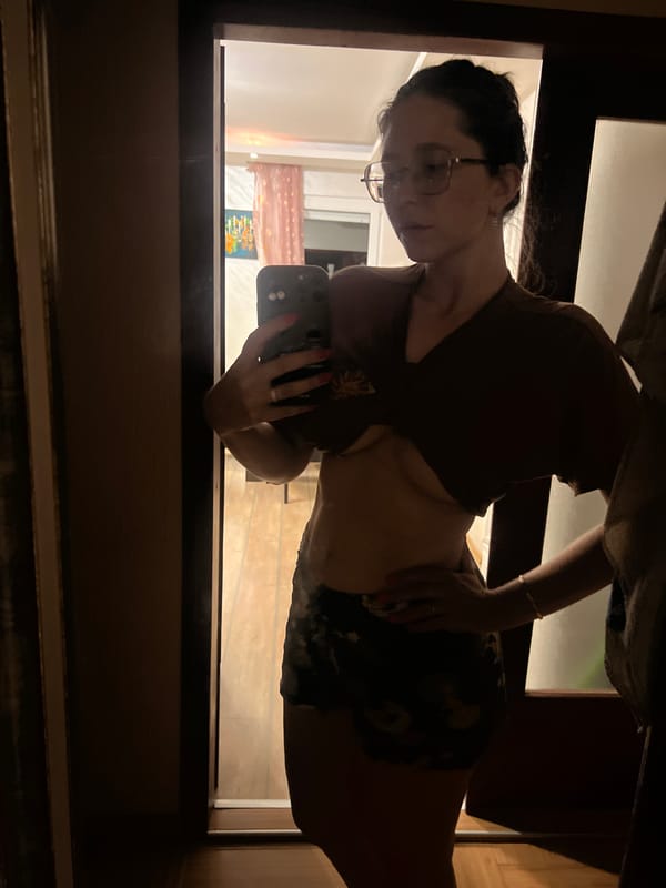 Woman takes mirror selfies in Podgorica apartment