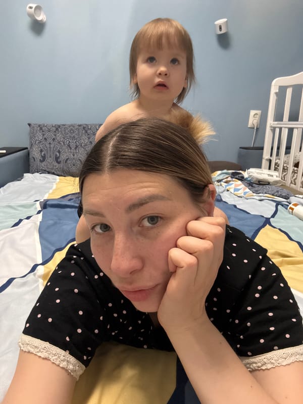 Mother and child share playful moments at Moscow home