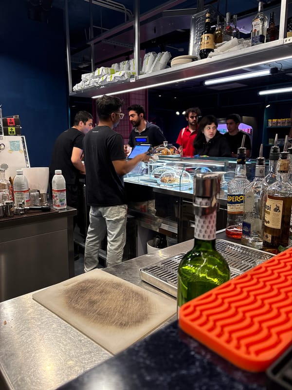 Evening café activity documented in Novate Milanese, Italy