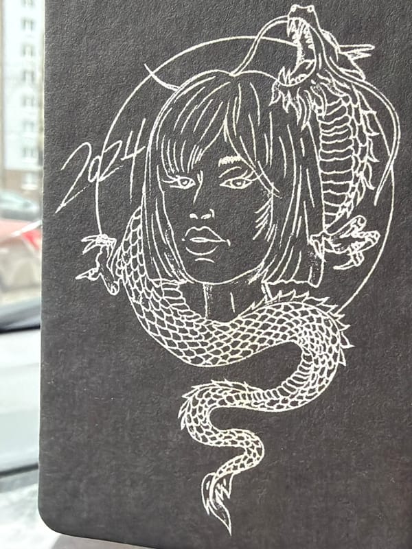 Dragon artwork and muddy truck documented in Izhevsk