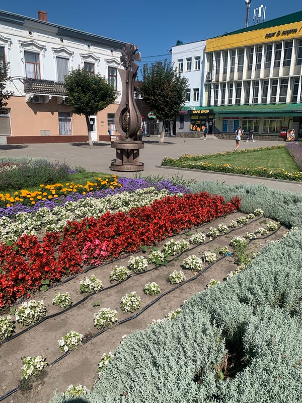 Kolomyia's central square on a bright summer afternoon