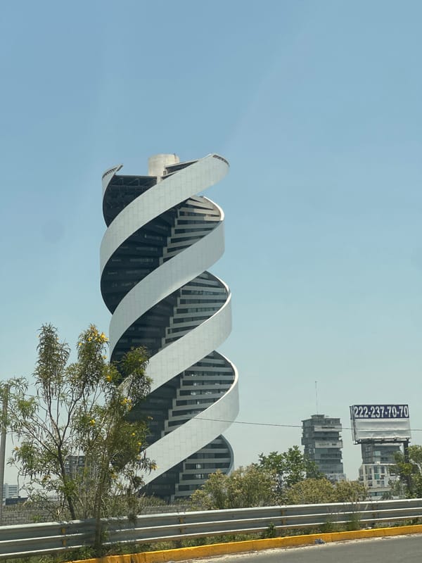 Modern spiral building captured in San Bernardino Tlaxcalancingo