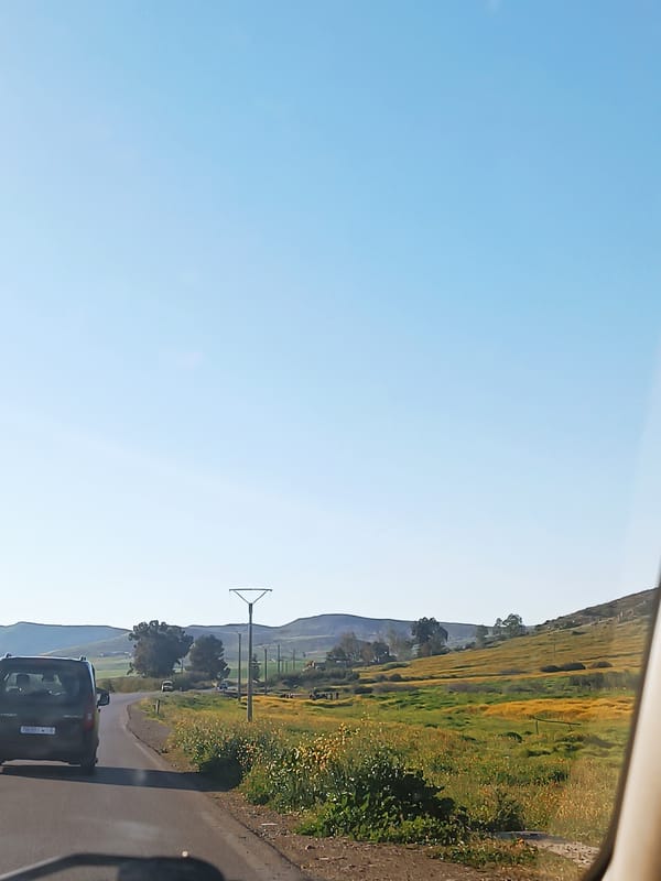 Van drives through rural Morocco countryside near El Hammam
