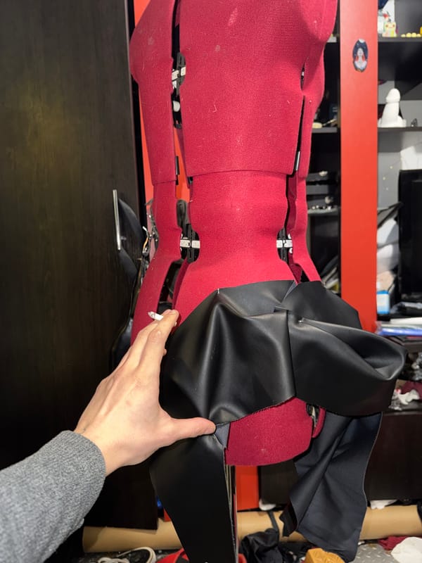 Fashion design workspace documented in Sofia evening hours