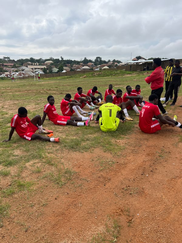 New Hope FC trains on a dusty Jos field on a July morning.