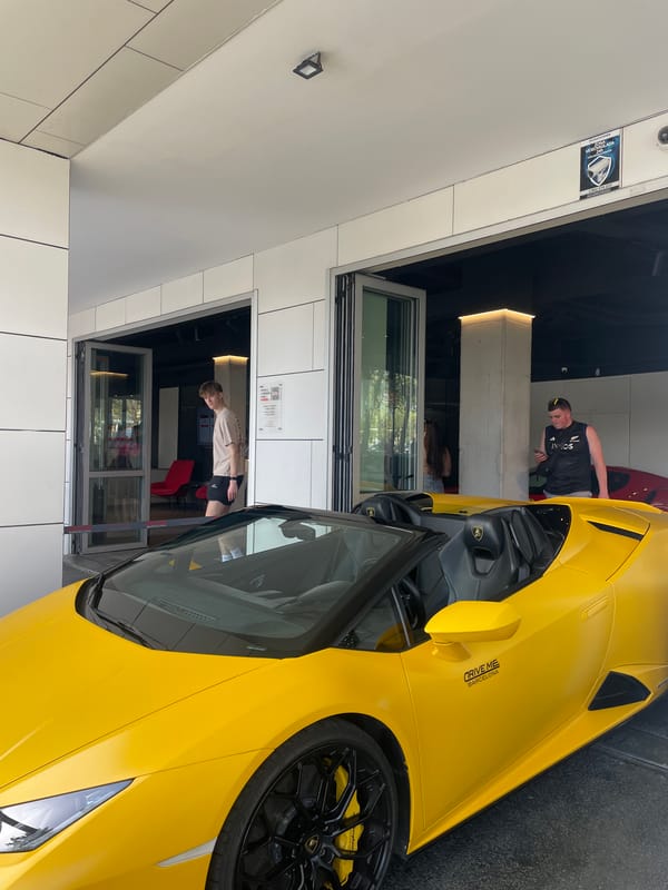 Luxury car gathering documented at Barcelona dealership Friday afternoon