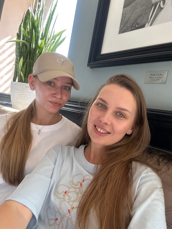 Two women share coffee and cake at Minsk restaurant