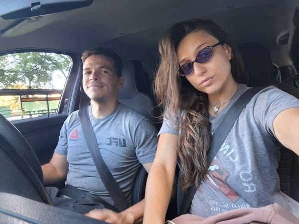 Couple documents drive through Buenos Aires city streets