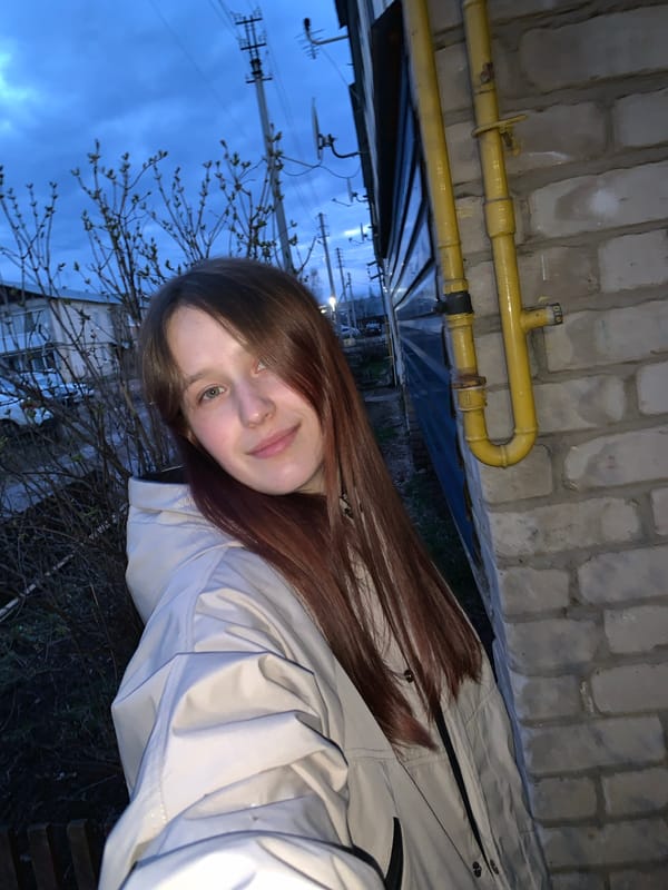 Young woman photographed in casual portraits around Фоки, Russia