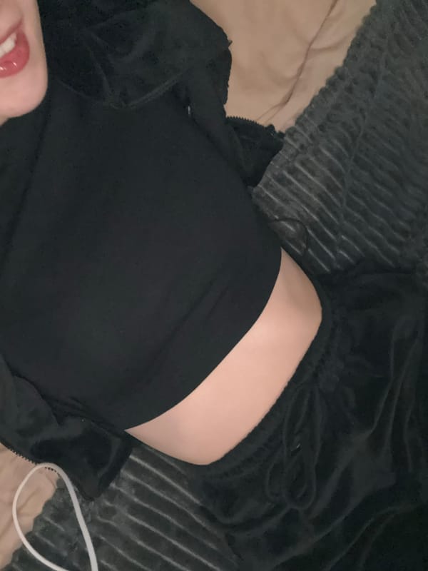 Person takes multiple selfies in black sportswear in Sofia