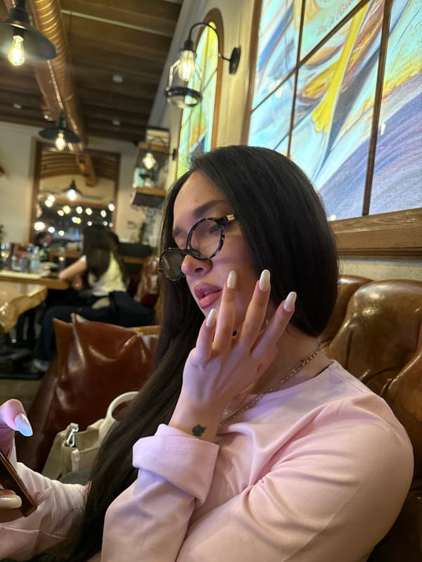 Woman enjoys extended coffee shop visit in Yerevan