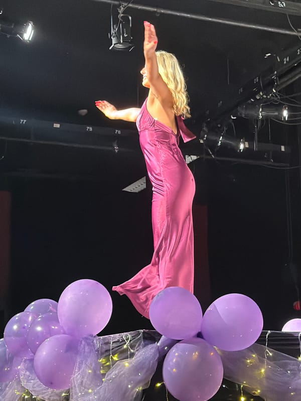 Formal stage event with evening wear participants in Palos Verdes