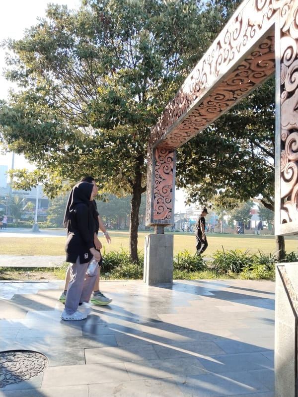 Morning activity at a public promenade in Kecamatan Pati
