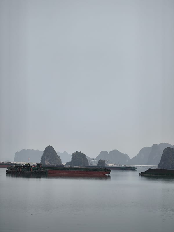 Morning view of Ha Long Bay karsts witnessed from Quang Hanh
