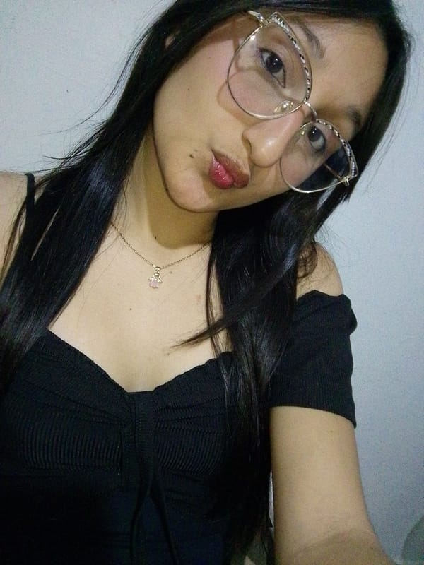 Woman records multiple selfie videos in Juangriego, Venezuela