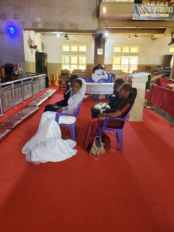 Wedding ceremony documented at Onitsha church with colorful attendees