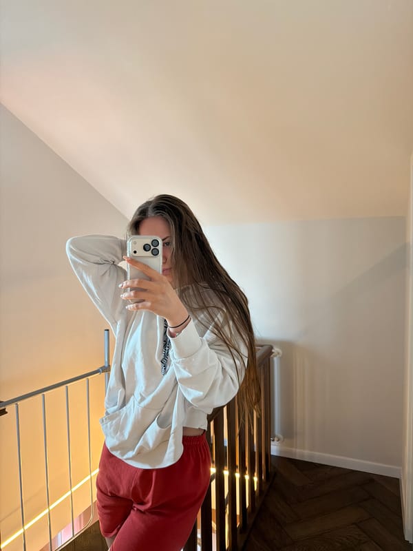 Woman documents morning routine with selfies in Buhovo, Bulgaria