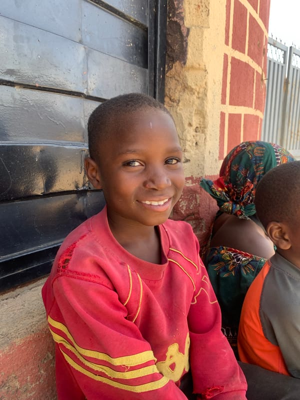 Daily life moments documented across Jos, Nigeria neighborhoods