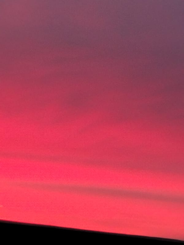 Dramatic red-pink sky gradient observed in Krasnogorskoye, Russia