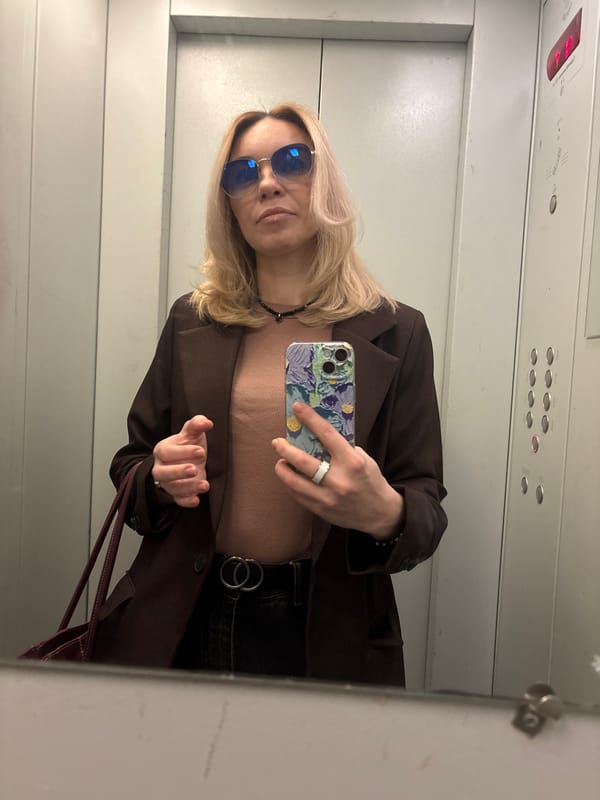 Woman photographed at multiple Vsevolozhsk locations during morning outing