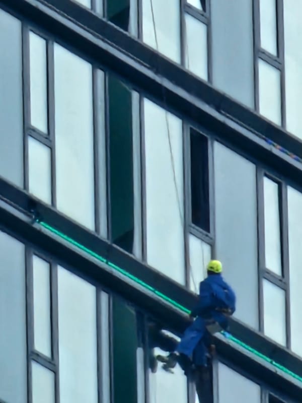 Rope access work on a Moscow glass high-rise