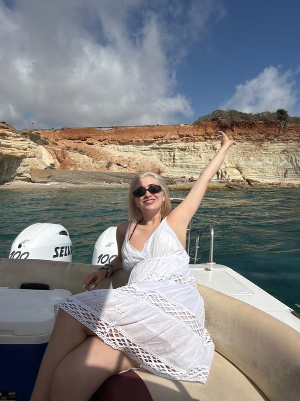 Boat tour documents Peyia Cyprus coastal cliffs and caves