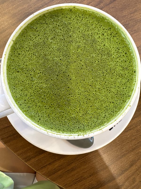 Morning coffee shop breakfast with matcha latte in Nha Trang