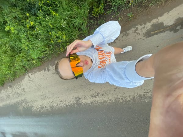 Bike ride selfies on a wet rural road in Подшивалово