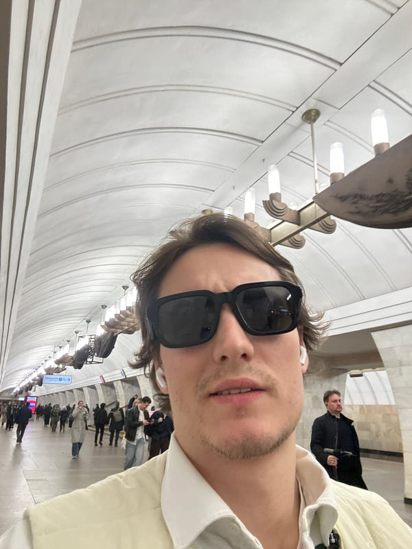 Person takes selfie in decorated Moscow Metro station