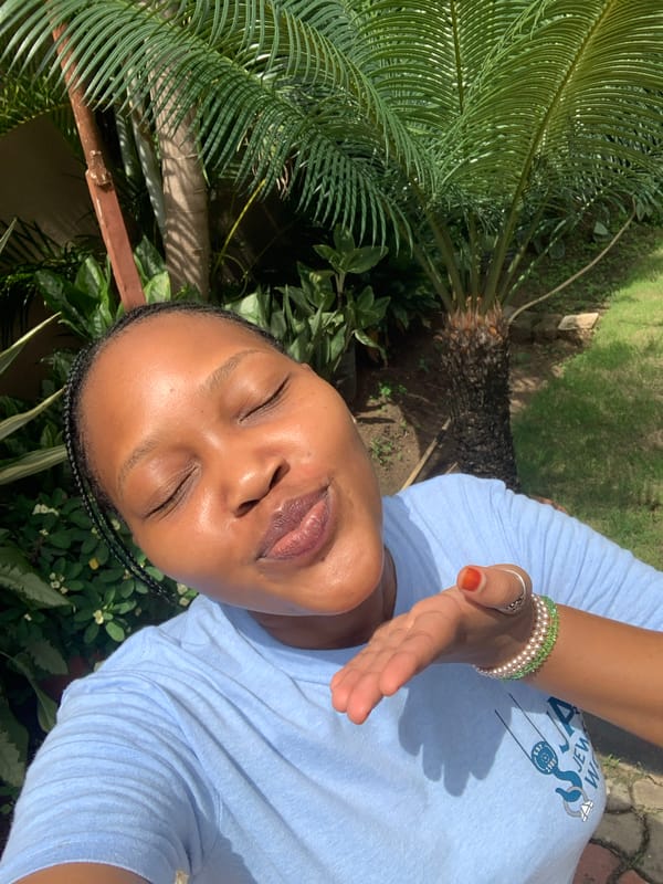 Woman observed resting outdoors in Dar es-Salaam morning