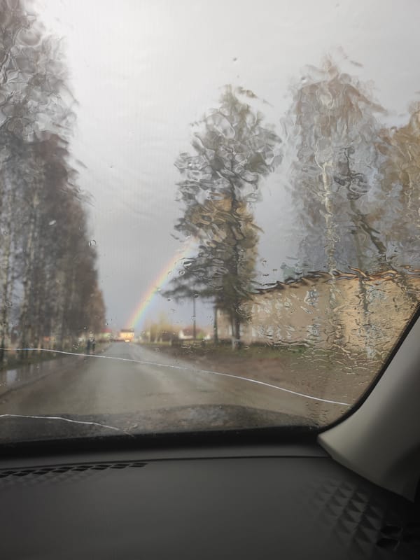 Rainbow appears over wet street in Votkinsk after rain