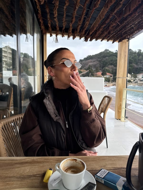 Couple dines at seaside cafes in Montenegro coastal town