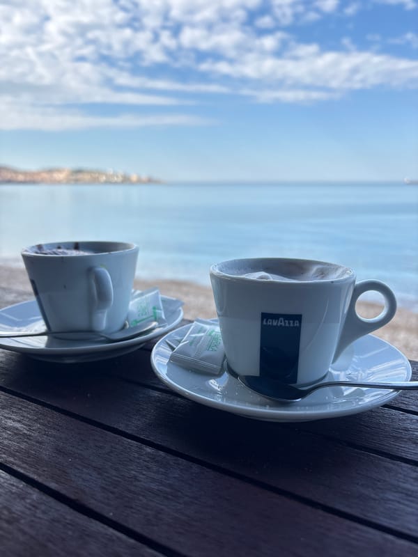 Morning coffee scene as small boat departs Bar Montenegro