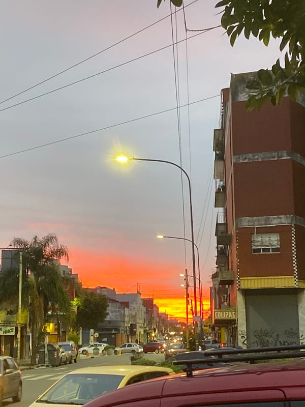 Sunset captured on Buenos Aires street with orange skies