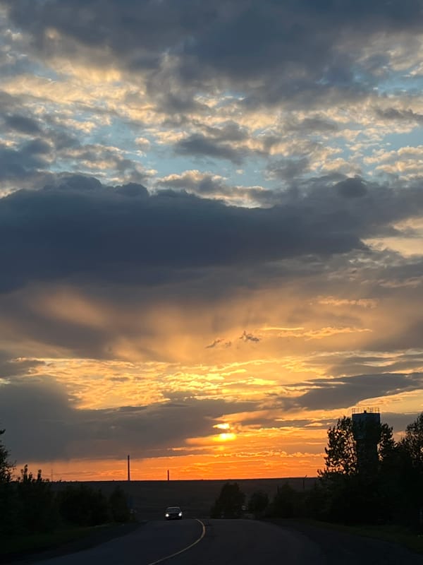 Sunset observed over Зыково, Russia with dramatic cloudy skies